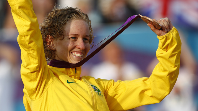 Bronze medallist Brazil's Yane Marques smiles during the women's modern pentathlon's victory ceremony at the London 2012 Olympic Games at Greenwich Park